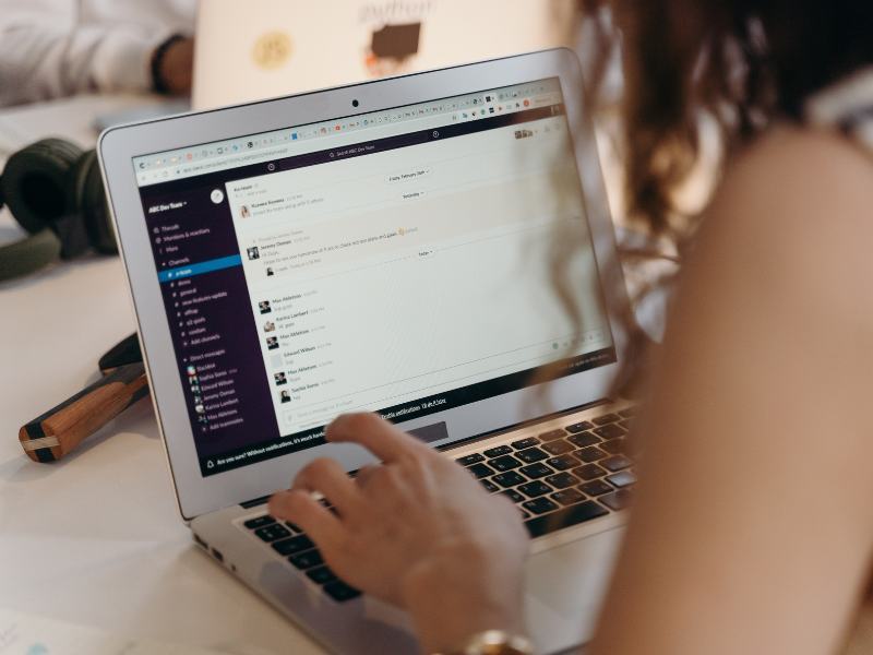 Woman using AI technology on laptop