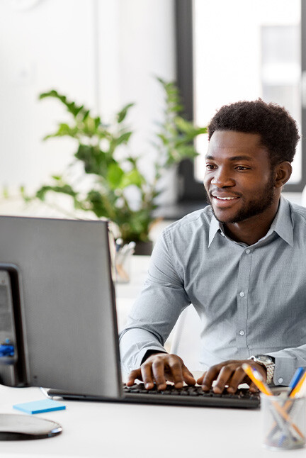 Businessman with computer working at office