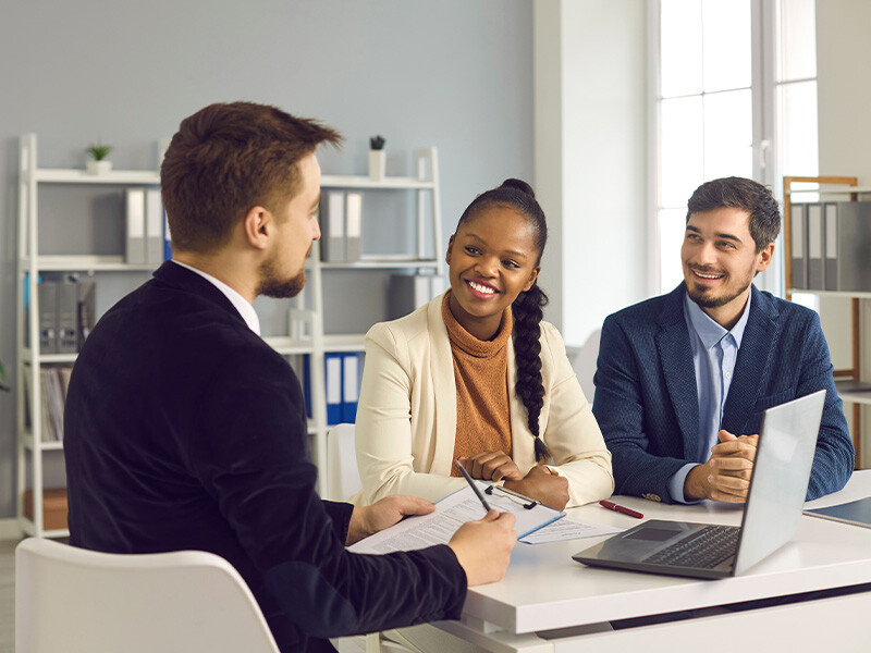 A group of office workers in a meeting