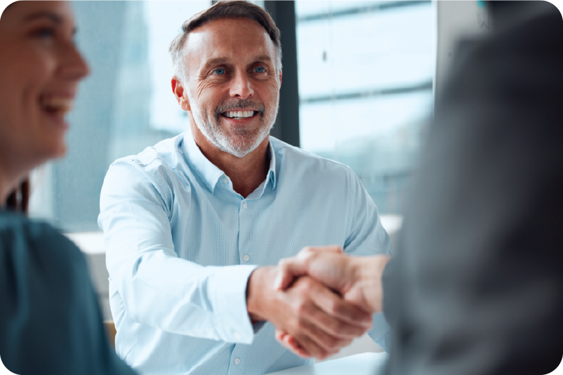 partner-shaking-hands-smiling